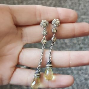 Long intricate earrings